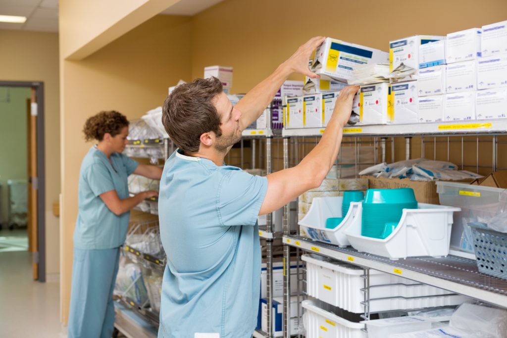 Nurses inventorying equipment, supplies, and medications.